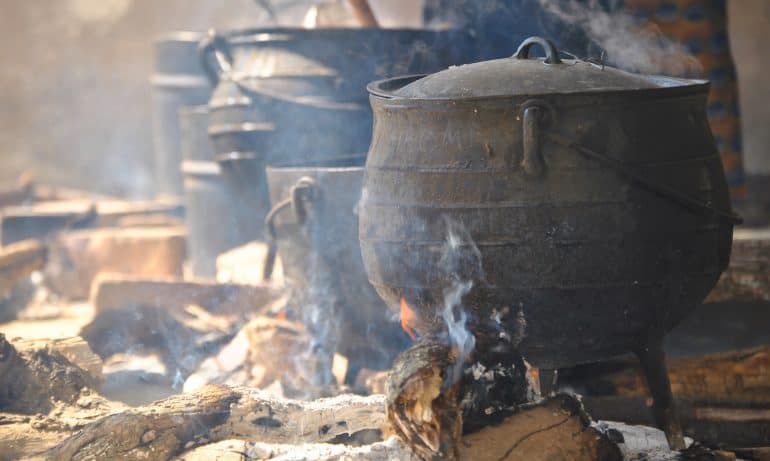 Old, soot-covered cooking stoves, highlighting the need for cleane cooking solutions